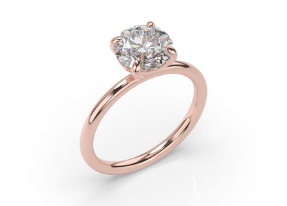 Four Claw Round Brilliant Solitaire Engagement Ring