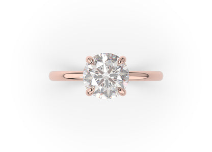 Four Claw Round Brilliant Solitaire Engagement Ring