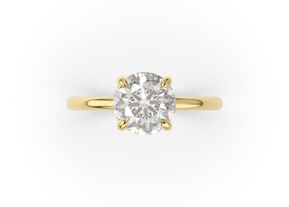 Four Claw Round Brilliant Solitaire Engagement Ring