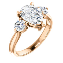 Pear Accent Engagement Ring