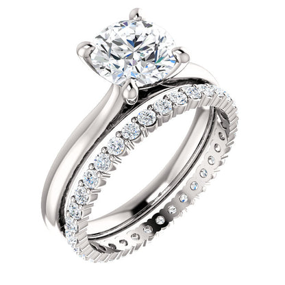 Four Claw Round Brilliant Solitaire Engagement Ring