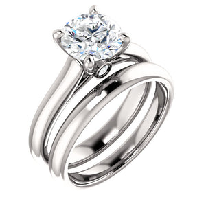 Four Claw Round Brilliant Solitaire Engagement Ring